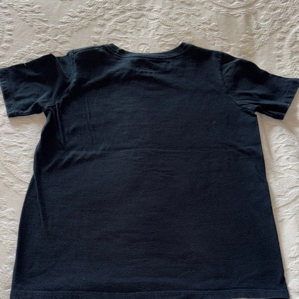 Gently loved Nike Kids Black T-Shirt with White Swoosh